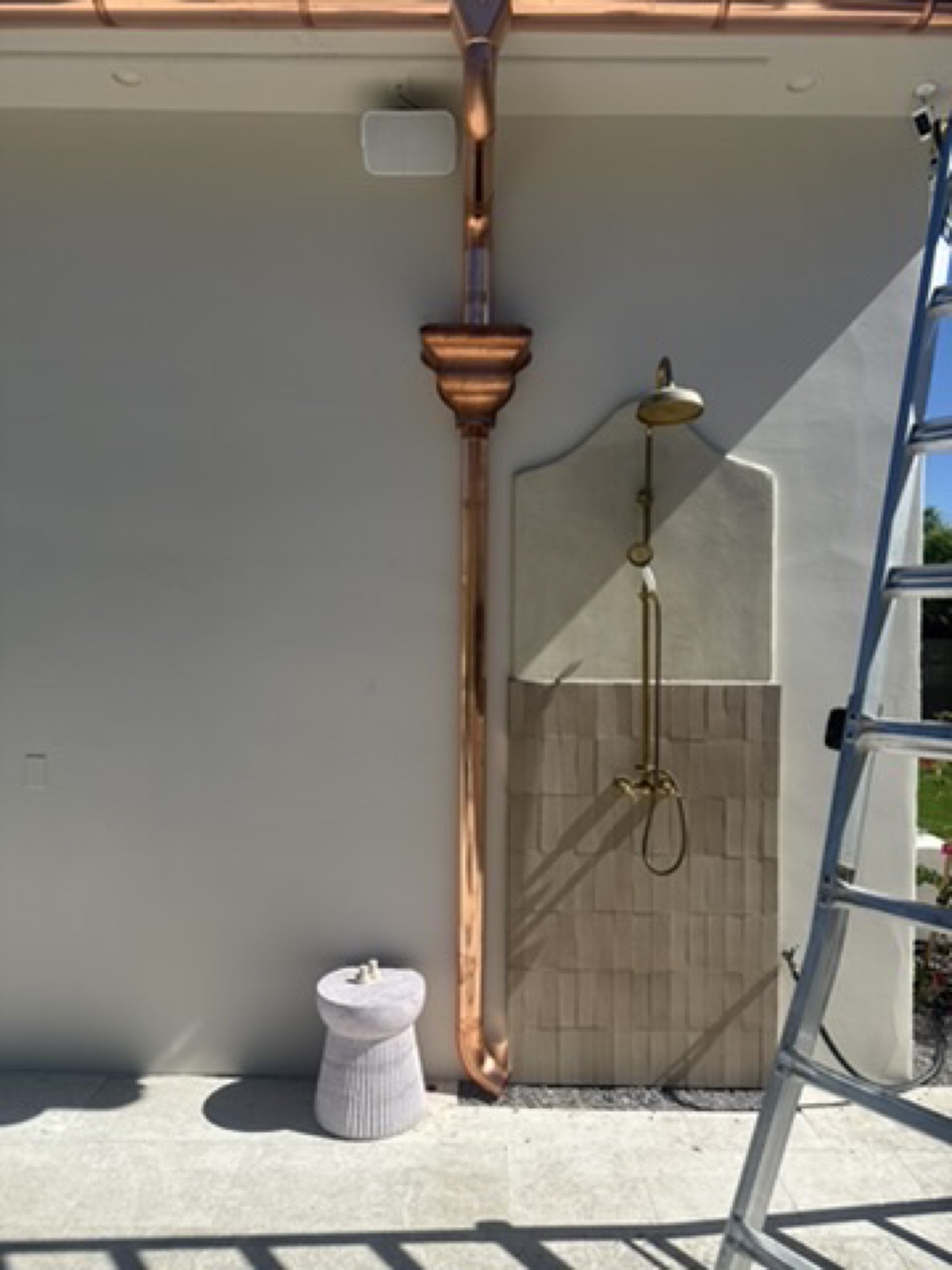City Seamless rain gutter downspout installation detail.
