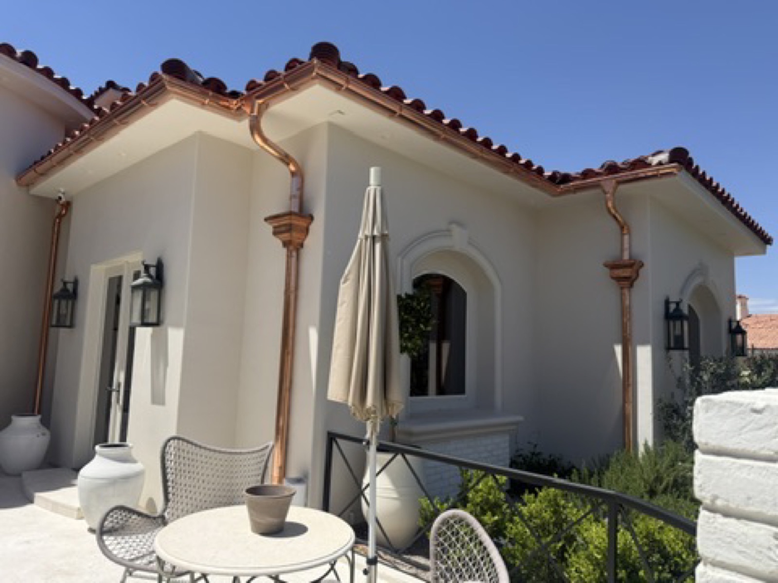 City Seamless half-round rain gutter installation on a custom home.