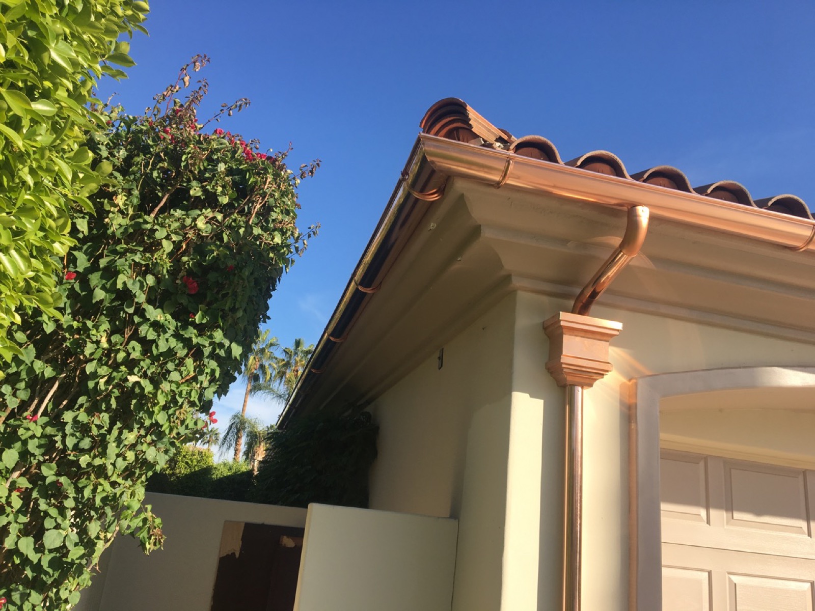 City Seamless half-round gutter with collection box and downspout drainage detail.