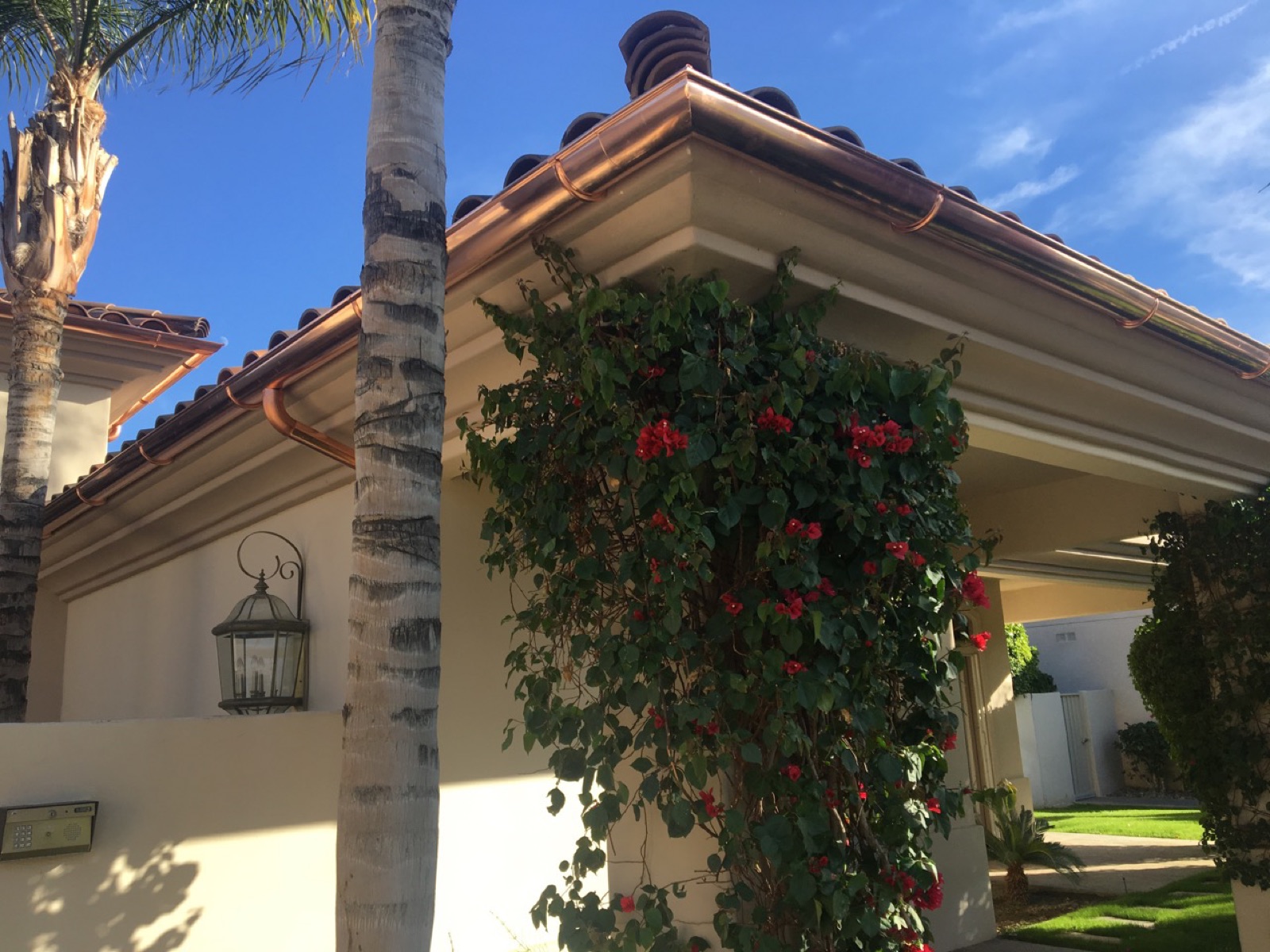 City Seamless half-round rain gutter installation on a custom home.