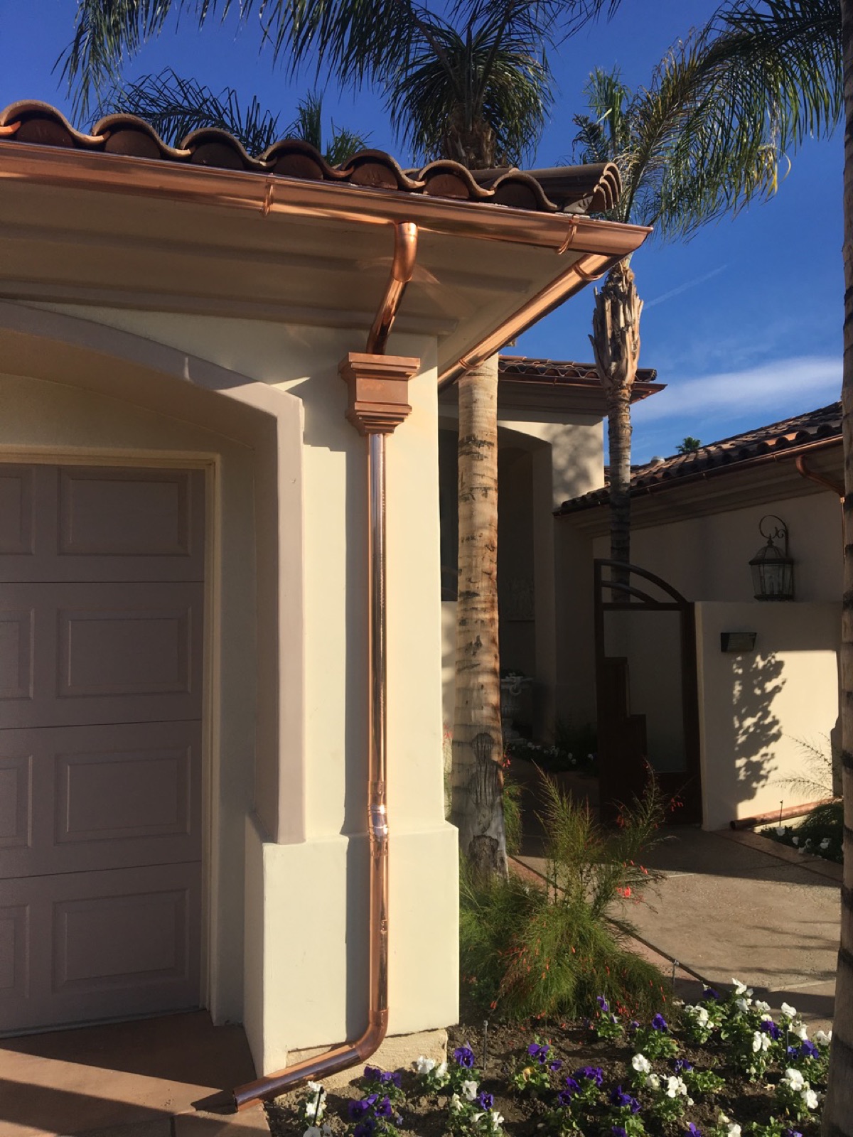 City Seamless half-round gutter with collection box and downspout drainage detail.