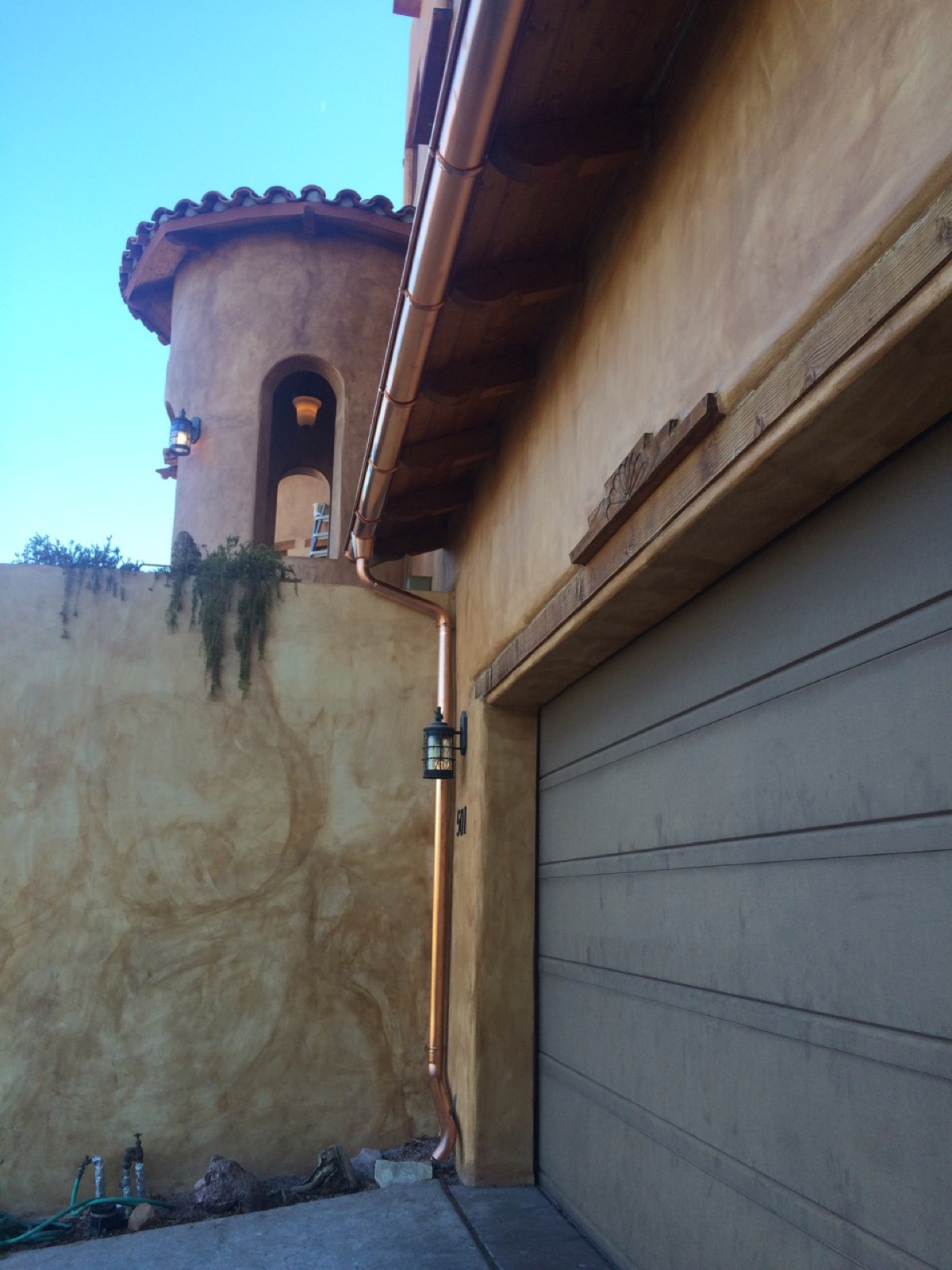 City Seamless half-round rain gutter installation on a custom home.