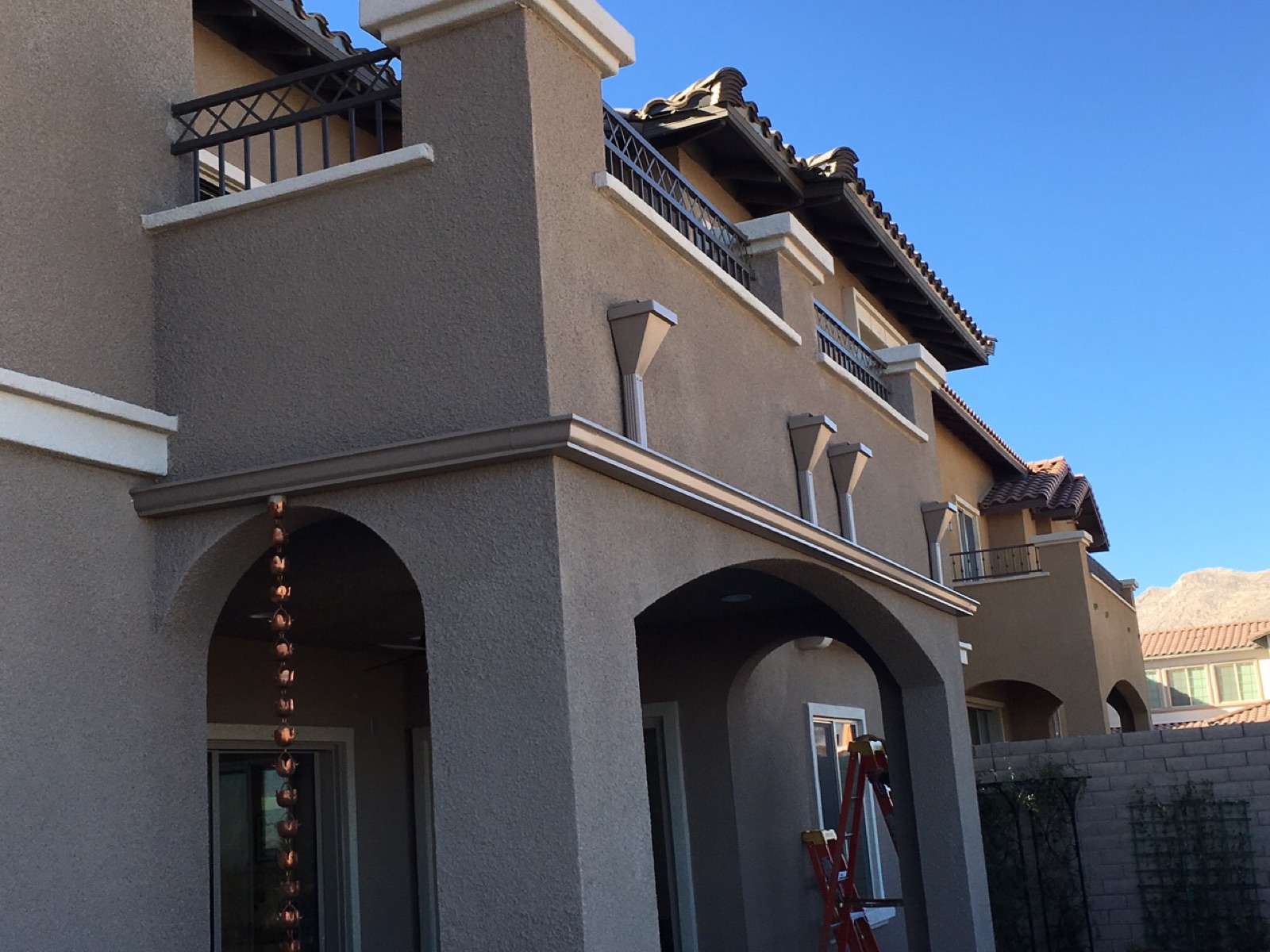 City Seamless K-style rain gutter connected to a collection box drainage detail.