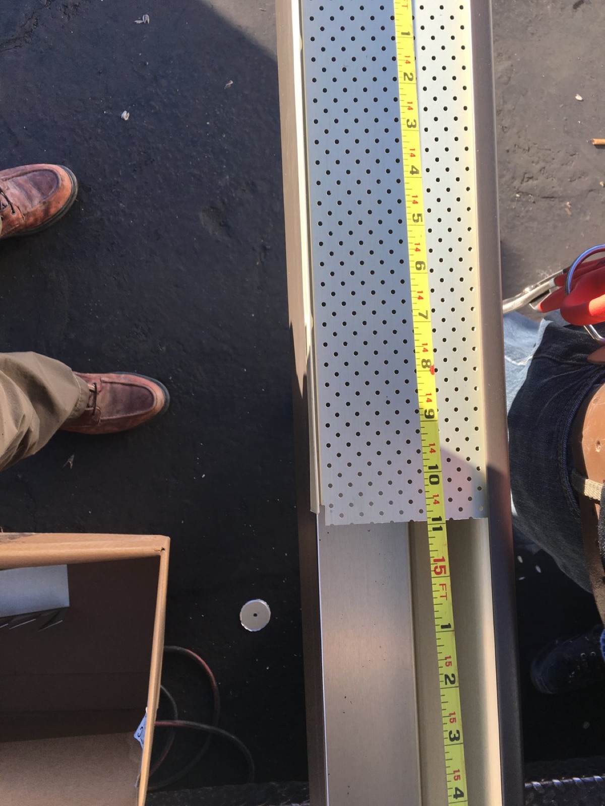 City Seamless leaf screen gutter guard installed over a seamless rain gutter.