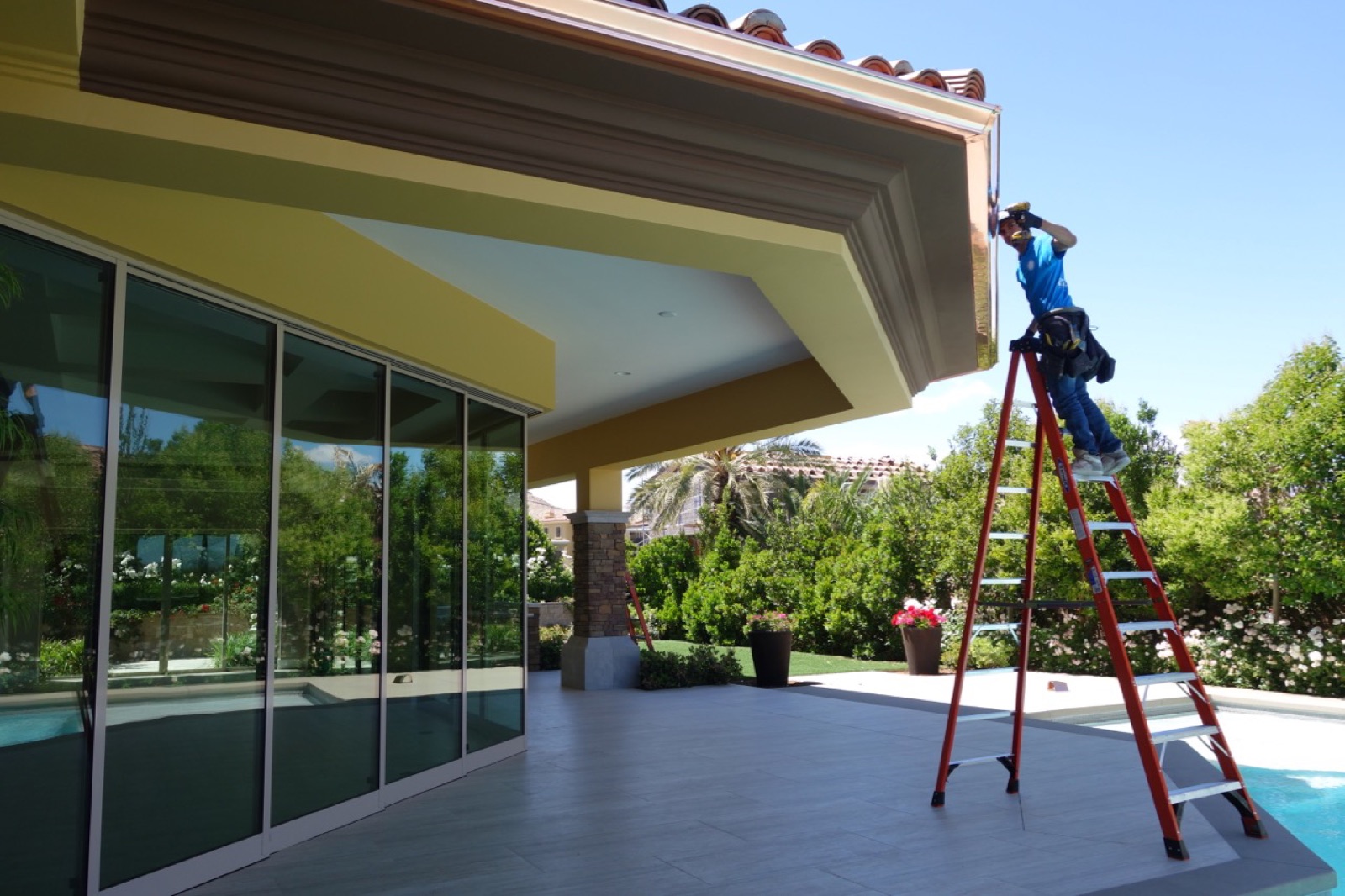 City Seamless rain gutter installation crew and equipment photo.
