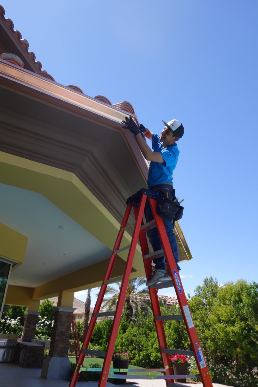 City Seamless rain gutter installation crew and equipment photo.
