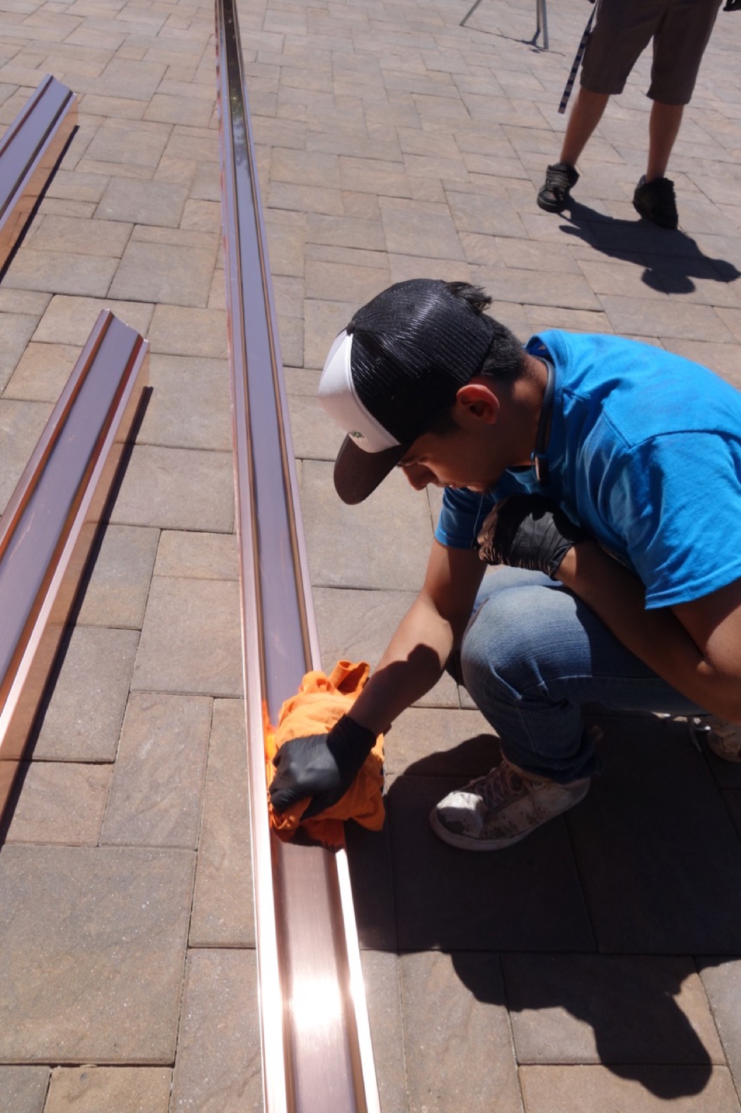 City Seamless rain gutter installation crew and equipment photo.