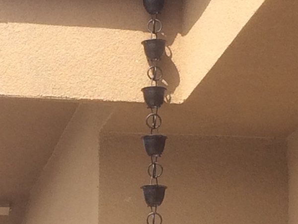 City Seamless rain chain detail for a custom gutter project.