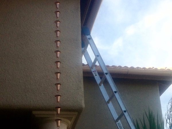 City Seamless rain chain detail for a custom gutter project.