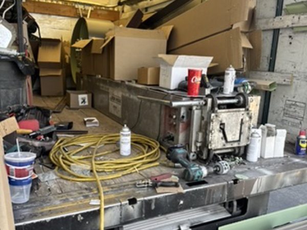 City Seamless rain gutter installation crew and equipment photo.