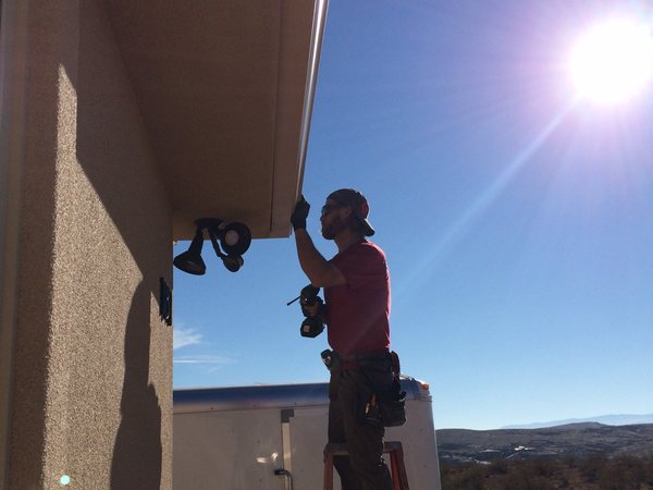 City Seamless rain gutter installation crew and equipment photo.